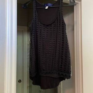 Black stitched shirt.